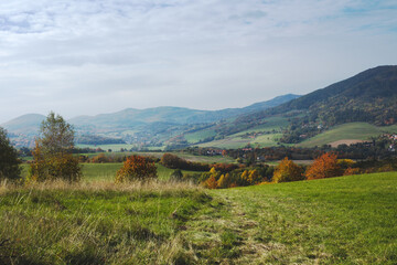Fototapeta na wymiar Hilly rural landscape in autumn season.