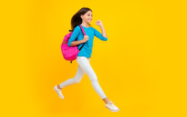 Fototapeta na wymiar School girl with backpack. Teenager student, isolated background. Learning and knowledge. Go study. Children education concept. Excited teenager, glad amazed and overjoyed emotions.