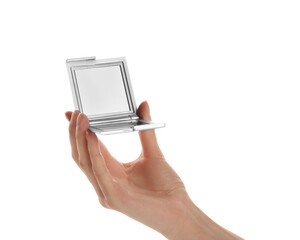 Woman holding stylish cosmetic pocket mirror on white background, closeup