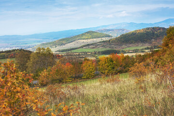 Hilly rural landscape in autumn season.