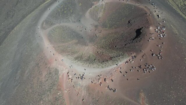 Aerial view of people at Silvestri craters on Mount Etna Volcano, Catania, Sicily, Italy.