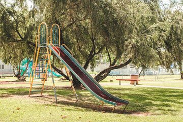 Fresh and beautiful green park in san juan puerto rico with kids slider and playground around and lovely environment with nature