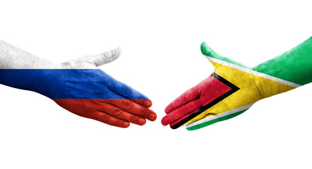 Handshake between Guyana and Russia flags painted on hands, isolated transparent image.