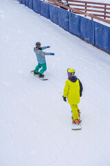 Winter. Ski slope, training slide, ski training, instructor and young skier