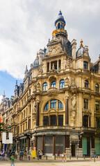 Baroque ornated building on Leysstraat, street of Belgian city Antwerp.