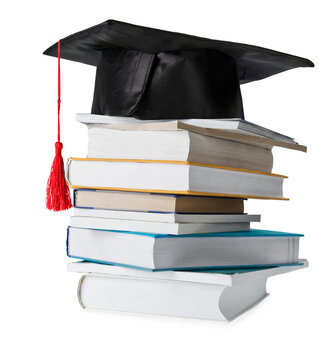 stack of different colored books with a graduation cap