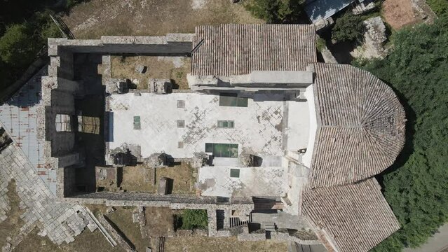 Aerial view of a destroyed and collapsed church due 1980 Irpinia earthquake, Archeological park of Conza della Campania, Avellino, Italia.