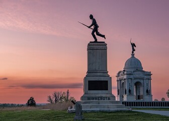1st Minnesota Infantry and Pennsylvania Monuments at Sunset - obrazy, fototapety, plakaty