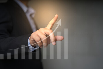 Business development to success and growing growth concept, Businessman pointing arrow graph corporate future growth plan