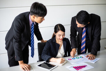 Asian businessmen working and sharing ideas meeting in company conference room