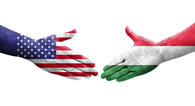 Handshake between Hungary and USA flags painted on hands, isolated transparent image.