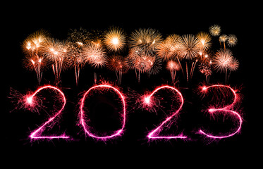 2023 happy new year fireworks celebration written sparkling at night.