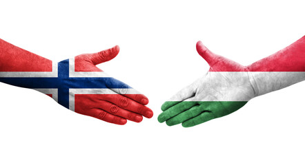 Handshake between Hungary and Norway flags painted on hands, isolated transparent image.