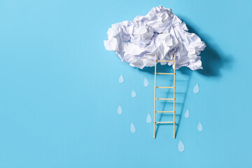 Cloud made of paper and ladder on color background © Pixel-Shot