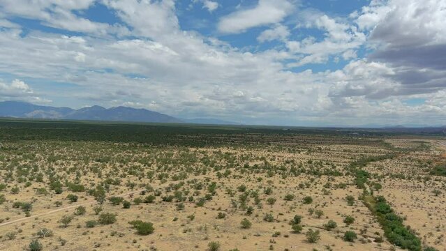 Wide aerial shot of the Sonoran desert in Arizona, slow moving drone shot