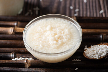 Delicious fermented glutinous rice wine on table