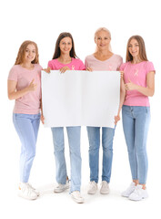 Beautiful women with pink awareness ribbons and blank poster on white background. Breast cancer concept