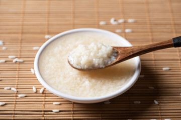 Delicious fermented glutinous rice wine on table