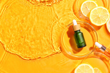 Bottle of vitamin C serum and lemon slices in water on color background