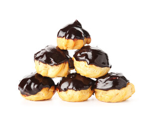 Heap of delicious eclairs on white background