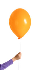 Woman with yellow balloon on white background