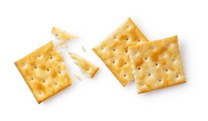 Broken crackers placed on a white background.