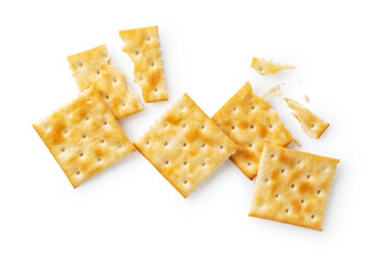 Broken crackers placed on a white background.