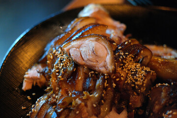 Korean food made with pork feet marinated in soy sauce and cut into easy-to-eat pieces
