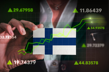 Graph growing up in Front Of Finland Flag. business state growing up concept.
