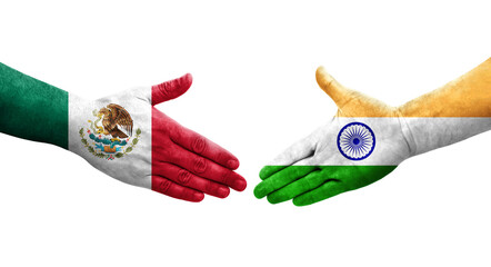 Handshake between India and Mexico flags painted on hands, isolated transparent image.