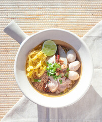 Noodles, Tom Yum, Thai food in a white bowl