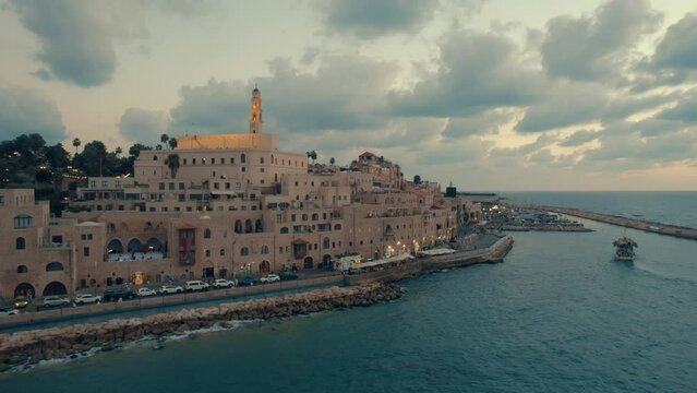 Aerial footage of Tel Aviv-Yafo skyline + jaffa port, St. Nicholas Armenian Orthodox Church, Israel - October 14, 2022 - #004