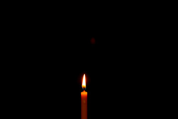 fire on candles in the dark