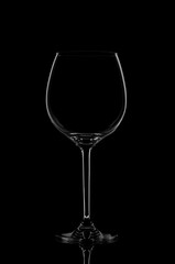 Silhouette wine glass on black