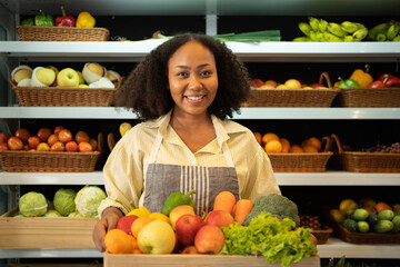 Portrait of a black african american woman working in a supermarket or retail shop and food on grocery products. Food shopping. People lifestyle. Business service. A staff worker