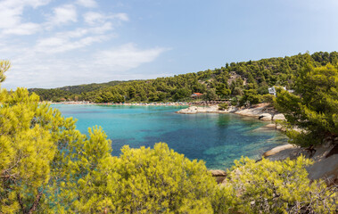 Fototapeta na wymiar Kalogria Beach in Sithonia, Halkidiki with turquoise shining sea during summer time in Greece.