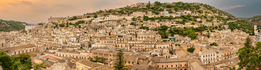 Fototapeta na wymiar Extra wide angle view of the historic center of Modica at sunset