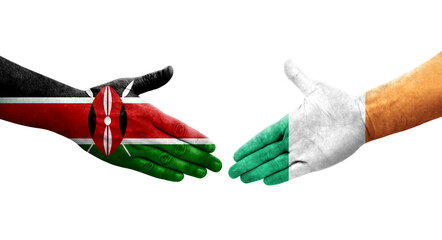 Handshake between Ireland and Kenya flags painted on hands, isolated transparent image.