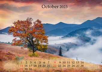 Horizontal wall calendar for 2023 year. October, B3 size. Set of calendars with amazing landscapes.   Misty autumn sunset in Carpathian mountains, Ukraine, Europe. Monthly calendar ready for print.