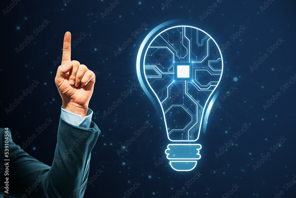 Aufkleber Close up of businessman hand pointing up with abstract glowing light bulb with chip hologram on blurry dark background. Artificial intelligence and neural network concept.
