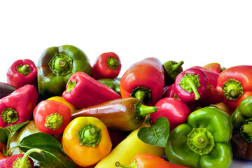 Red, green and yellow fresh bell pepper on an isolated white background. Vegetable background of sweet pepper, paprika. Harvest from the garden.