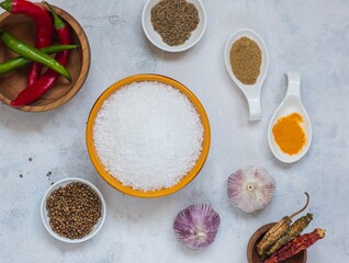 Prepared Ingredients for cooking salt with spices, Svan salt on a light concrete background. Recipes for spices, spicy salt.