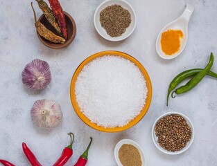 Prepared Ingredients for cooking salt with spices, Svan salt on a light concrete background. Recipes for spices, spicy salt.