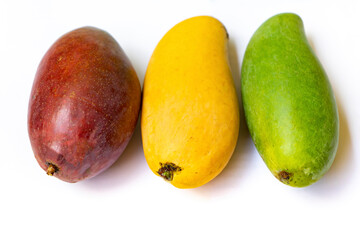 Various species of mango with isolated white background. mango fruit is one of the most popular, nutritionally rich fruits with unique flavor, fragrance, taste, and heath promoting qualities.