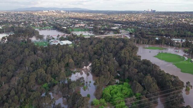 Aerial view over the sporting fields in Bulleen Park inundated with flood water on 14 October 2022. Melbourne, Victoria, Australia