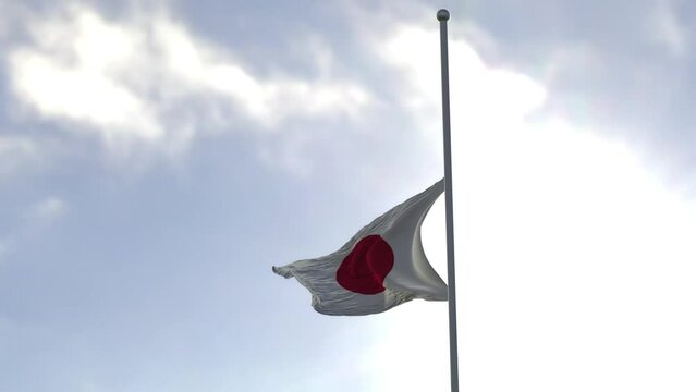 Flag of Japan half mast in the wind. High bitrate slow motion animation in 4K.