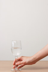 Holding wine glass