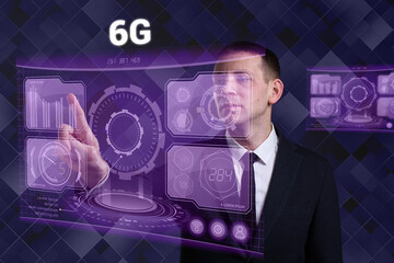 Business, Technology, Internet and network concept. Young businessman working on a virtual screen of the future and sees the inscription: 6G