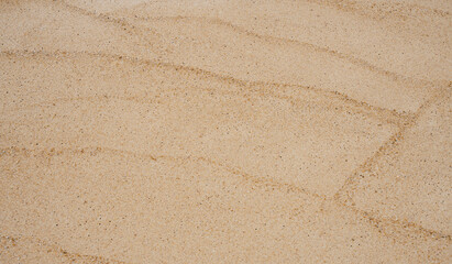 Fototapeta na wymiar Sand texture, Beach sand dune surface background, Top view nature of brown sandy wave, Flat lay wavy sea sand
