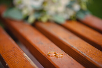 Two wedding rings on the floor with contrast